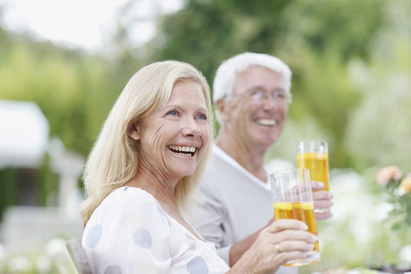 Senior couple drinking iced tea